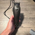 Oster Fast Feed Electric Hair Clipper Black Corded Square Blade. Fixed Price $27.00.