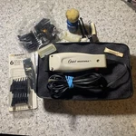 Oster Adjustable Hair Clippers Model 059751-045-000 & Accessories Set Case. Fixed Price $15.15.