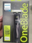 Philips Norelco Oneblade Hybrid Trimmer & Shaver W/ 2 Combs New Sealed. Fixed Price $28.00.