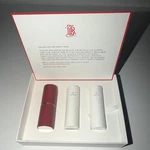 Bouche Rouge Refillable Red Leather Lipstick Case Set W/ Rosewood And Chesnut. Fixed Price $45.00.