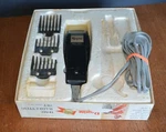 Vtg Raycine Model 600-08 Gold Label Hair Clippers Home Cutting Set. Fixed Price $30.00.