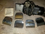 Antique Oster Model 111 Progienic Detachable Blade Clipper, Brush, Guide Combs. Fixed Price $69.99.