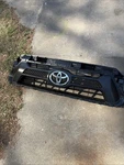 2012-2015 Toyota Tacoma Oem Front Grille Black/gray Trim W/emblem Inner. Fixed Price $115.00.