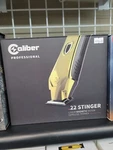 Caliber .22 Stinger Linear Magnetic Motor Cordless Trimmer, 3 Color Lid. Fixed Price $100.00.
