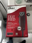 Oster Fast Feed Clipper Burgundy Lightweight Whisper Quiet Motor Square Blade. Fixed Price $66.99.