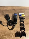 Oster Topaz Clipper With Adjustable Cryonyx Blade System 23-310A + Combs & Oil. Fixed Price $65.00.
