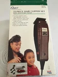 Oster Adjustable Hair Clipper Model 284-16 W/attachments. Fixed Price $26.95.