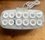 Conair Pro Ceramic Tools Porcelain Series 12 Hot Rollers And 11 Clips CHV14. Fixed Price $20.00.