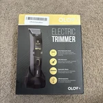 Olov Electric Hair Trimmer - New Sealed. Fixed Price $31.00.