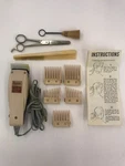 Raycine Deluxe Adjustable Hair Clippers Model 284 Series Vintage Dusty Pink. Fixed Price $35.00.