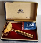 Vtg. Gem Junior Goldtone Safety Razor, 4 Star Blades, Orig. Box Nos. Fixed Price $32.00.