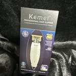 Kemei Hair Trimmer Baldheaded Beard Clipper Cordless Grooming Kits KM-1931. Fixed Price $20.00.