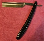 Wade & Butcher 5/8 Straight Razor Sheffield England Black Handle Hollow Ground. Fixed Price $44.95.