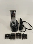 Andis D-4 Trimmer Cordless Hair Clipper W/ Charging Stand & Guide Combs. Fixed Price $35.91.