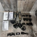Oster Spirit Model 76975-310 & Baby Clippers Silver Black Set With Attachments. Fixed Price $67.99.