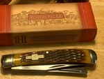 Rough Ryder Amber Jigged Bone Razor Trapper 4 1/8" Pocket Knife RR072. Fixed Price $21.98.